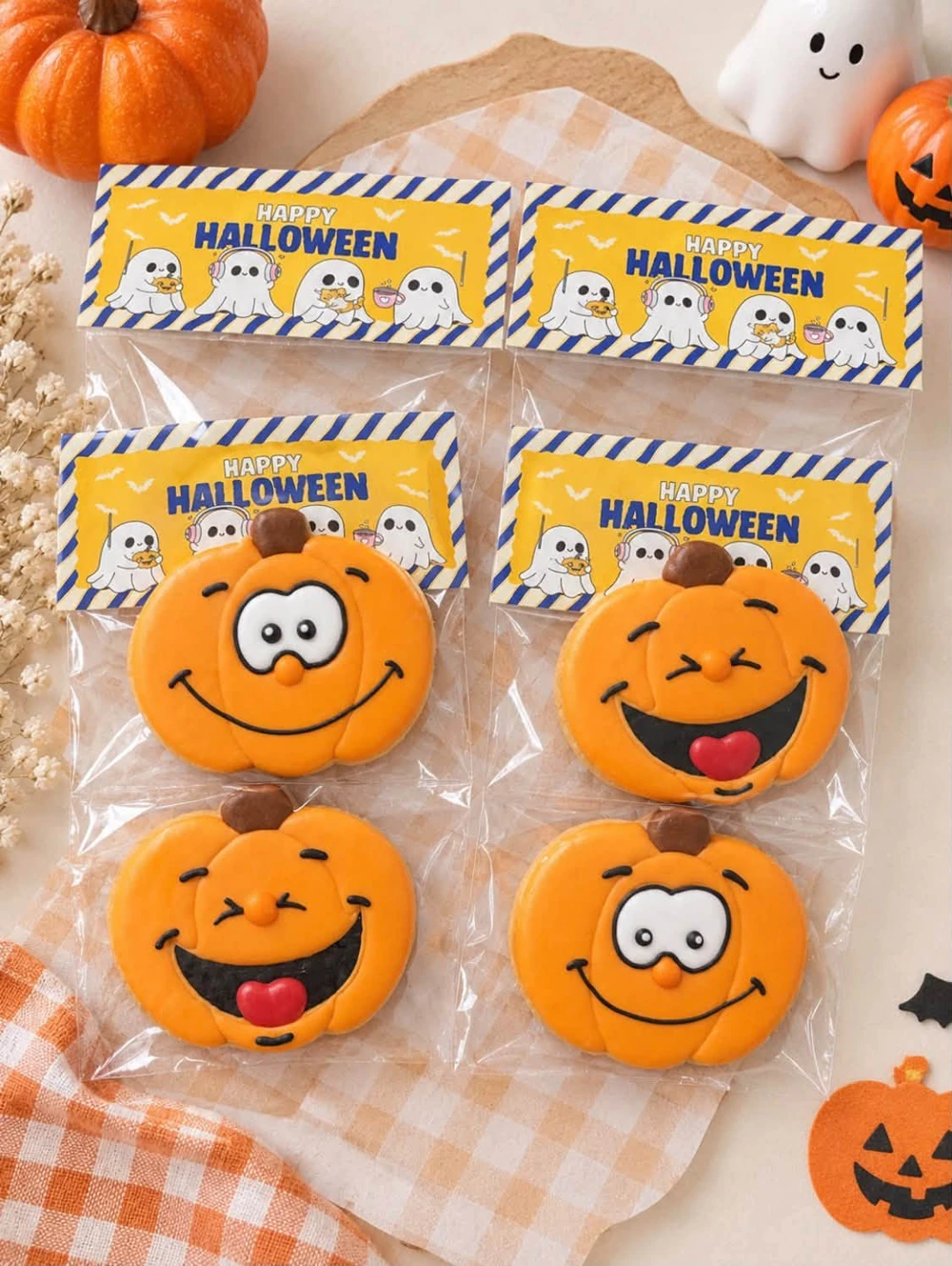 Smiling pumpkin cookies in Halloween gift packaging